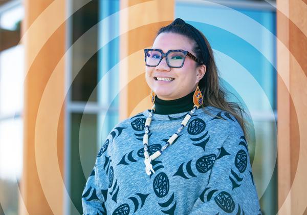 Young woman in modern Indigenous clothing. 