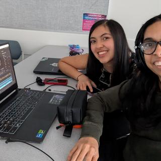 Two students work on an assignment together