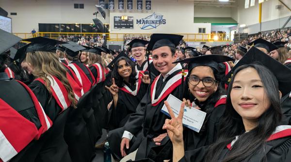 Rebecca-Duarte-graduating-with-her-friends
