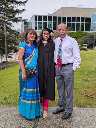 Rebecca-Duarte-with-her-parents-during-graduation