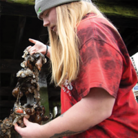 Person inspecting seaweed